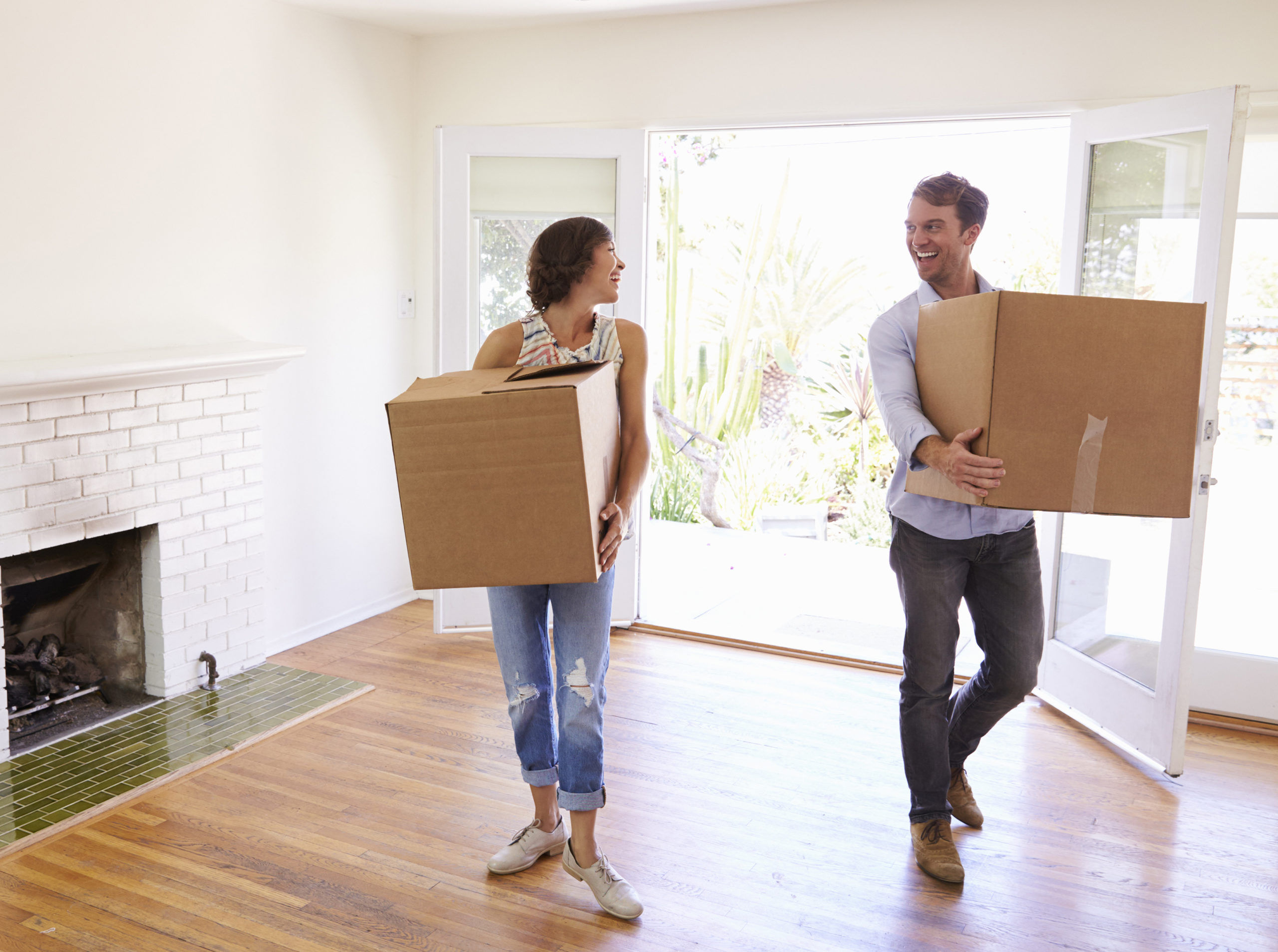 Young Couple Moving Into a New Home