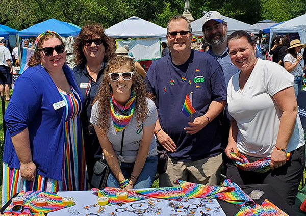 6 GSB employees at a Pride event