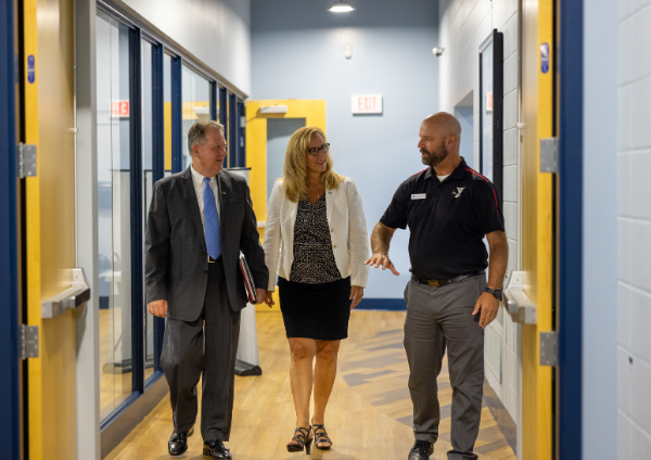 GSB employees walking through local YMCA