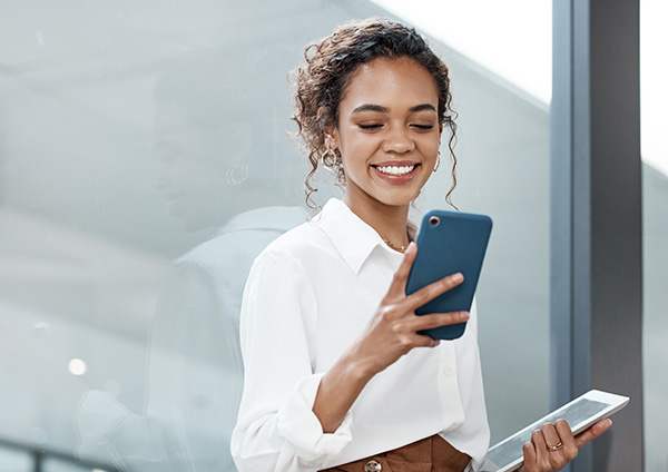 Business woman choosing a product on phone