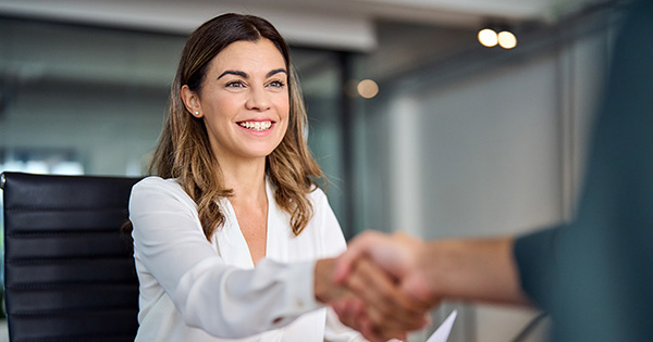 Business woman shaking hand