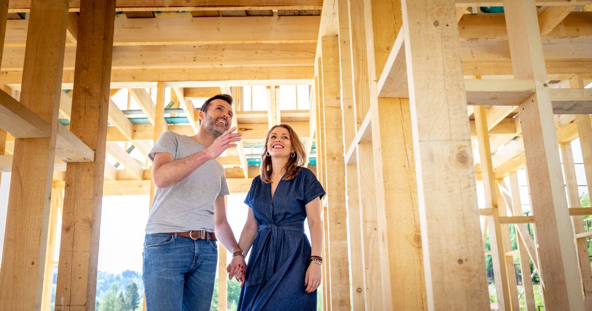 Couple inside of a new home build under construction